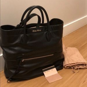 Miu Miu Vitello bag in Black with Crossbody strap